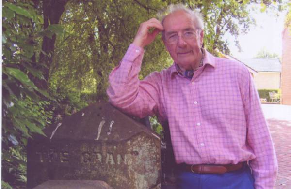 John Blackton standing by the remaining stone gatepost