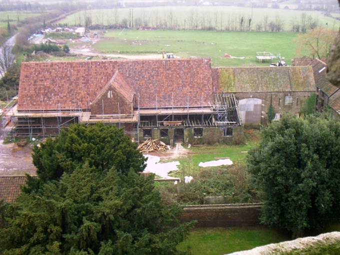 barn under repair viewed from church tower