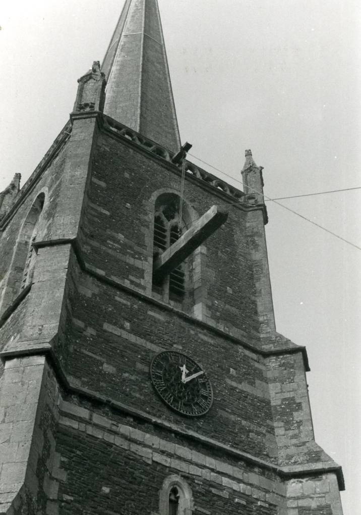 oak beam being removed from tower