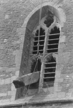 oak beam being removed from tower