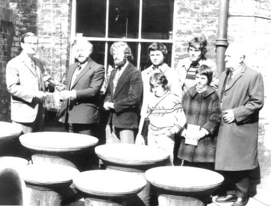 Winterbourne handbell ringers and family collect their bells from Whitechapel